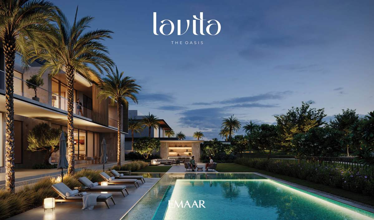 Lavita pool and outdoor kitchen at night